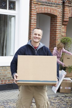 Man and van loading furniture for a local move in Heston