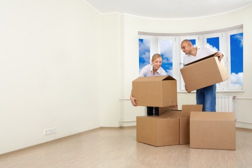 Packed boxes and furniture ready for a Heston moving van