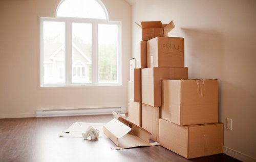 Residential move in Heston with boxes and furniture being transported