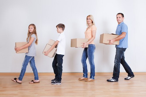 Packed boxes and furniture ready for local house removals